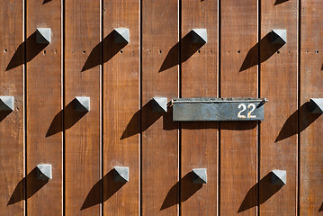 Image showing Old door with mailbox