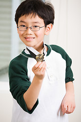 Image showing Winning boy with his medal