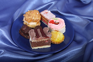 Image showing selection of sweet deserts on the plate