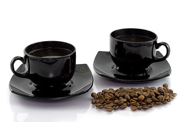 Image showing Two cups and coffee beens