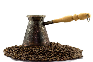 Image showing Turk on coffee beens