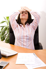 Image showing  stressed with her work