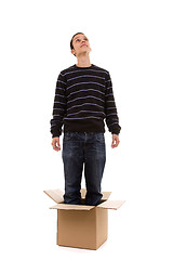 Image showing young man inside the box