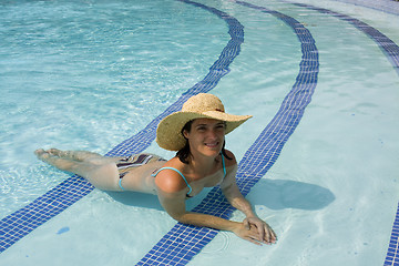 Image showing Relaxing at the pool