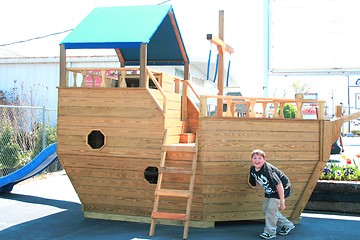 Image showing Young boy playing on ship