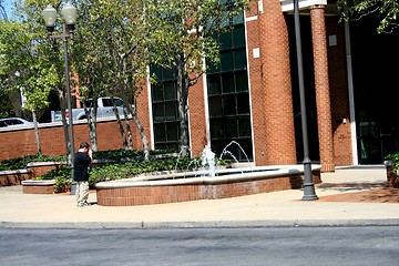 Image showing Young boy taking photos