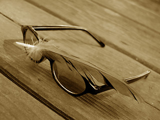 Image showing Sunglasses And Feather 2