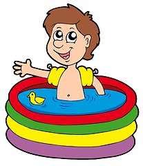 Image showing Boy in inflatable pool