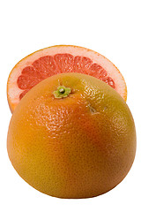 Image showing Couple halfs of grapefruit isolated on white background