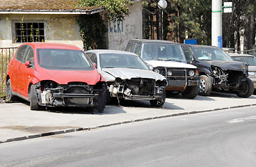 Image showing Crashed cars parked