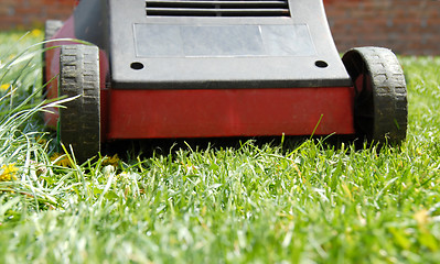 Image showing Mower in grass