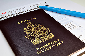 Image showing Canadian passport and Customs declaration form