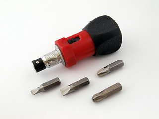 Image showing Ratchet screw  driver and spare bits. 