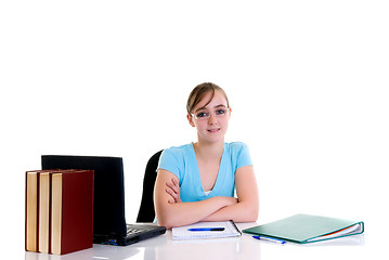 Image showing Teenager girl on desk