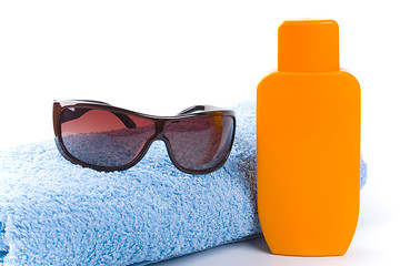 Image showing towel, sunglasses and lotion