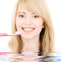 Image showing happy girl with toothbrush