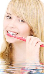 Image showing happy girl with toothbrush