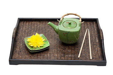 Image showing Bamboo tray, green ceramic teapot
