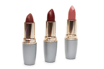Image showing Three feminine lipsticks