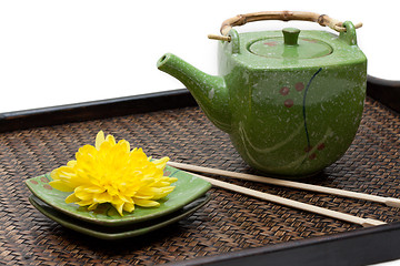 Image showing Bamboo tray, green ceramic teapot