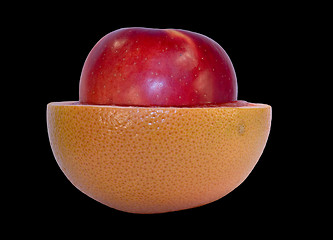 Image showing Grapefruit and apple isolated on black background with clipping