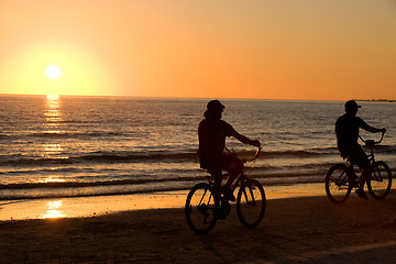 Image showing Riding bike together