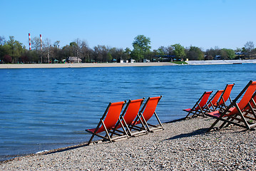 Image showing Orange folding chairs