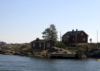 Image showing Red wooden houses