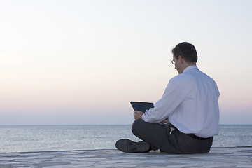 Image showing Businessman working with laptop