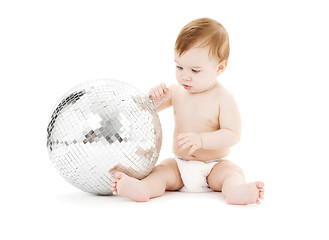 Image showing adorable baby boy with big disco ball