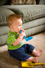 Image showing Baby Boy with Toys