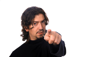 Image showing casual man pointing (focus on the finger)