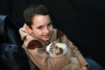 Image showing boy with cat