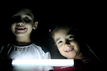 Image showing children portrait with light