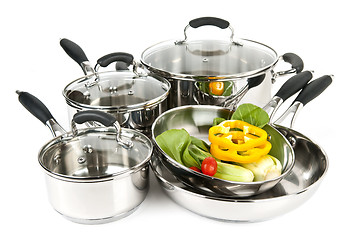 Image showing Stainless steel pots and pans with vegetables