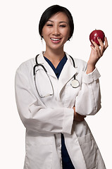 Image showing Doctor with apple