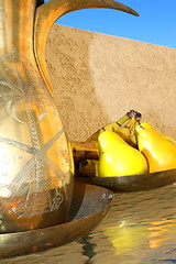 Image showing Brass Decanter And Fruits On A Table