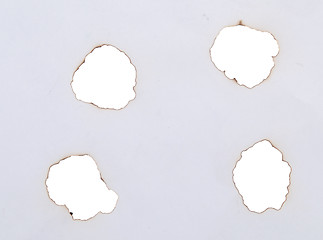 Image showing burnt holes