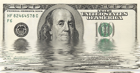 Image showing dollars in water