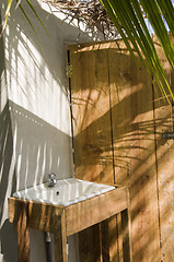 Image showing outdoor sink washroom next to outhouse nicaragua