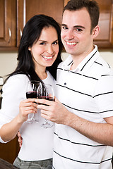 Image showing Young couple in the kitchen