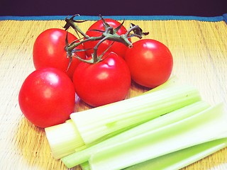 Image showing Tomatoes and celery sticks