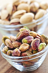 Image showing Pistachio nuts in glass bowls