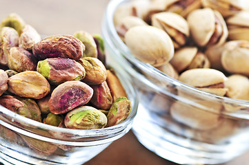 Image showing Pistachio nuts in glass bowls