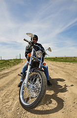 Image showing Resting biker