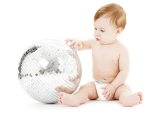 Image showing adorable baby boy with big disco ball