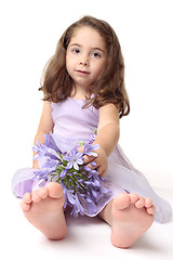 Image showing Toddler girl with flowers