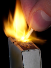 Image showing Igniting match