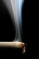 Image showing cigarette smoke on black