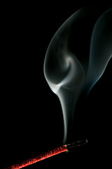 Image showing incense smoke over black